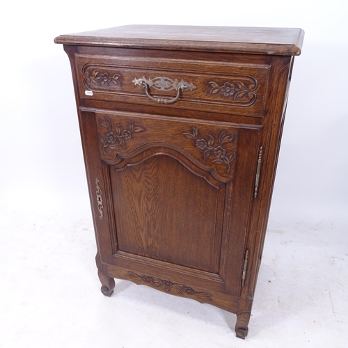 2158 - A Continental oak side cabinet, with single carved frieze drawer and cupboard under, W66cm, H105cm, ... 