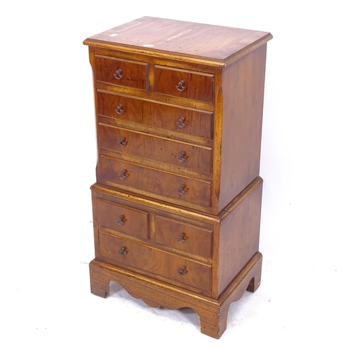 2163 - A reproduction yew wood chest on chest, of small size, W45cm, H82cm, D30cm