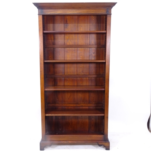 2169 - A modern oak tall open bookcase with 4 adjustable shelves, W102cm, H191cm, D33cm