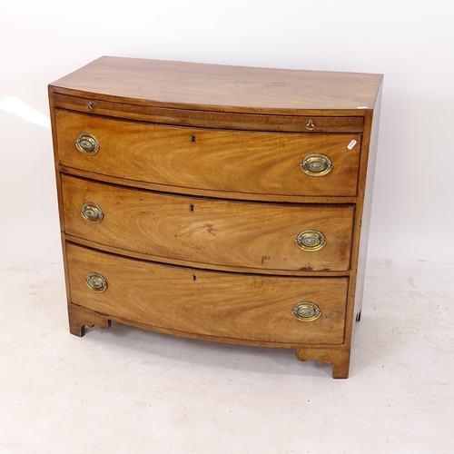 2182 - A 19th century mahogany bow-front bachelor's chest, with brushing slide and 3 long drawers under, on... 