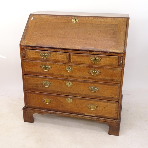 2183 - An 18th century crossbanded oak bureau, with a fitted interior, 2 short and 3 long drawers, on brack... 