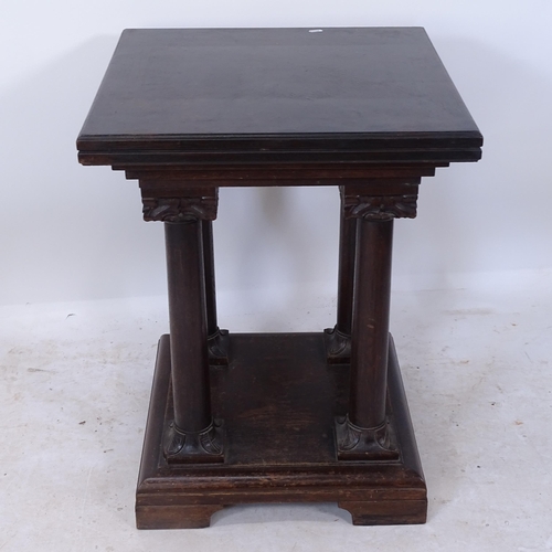 2197 - An Antique oak square display stand, with quadruple turned columns, on a platform base with bracket ... 