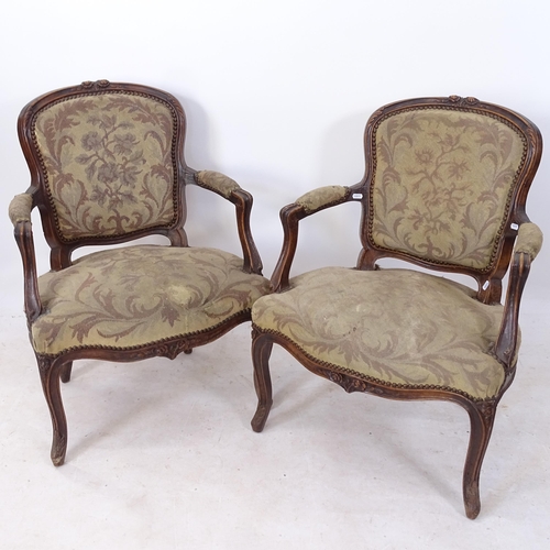 2205 - A pair of Antique carved mahogany-framed open-arm chairs