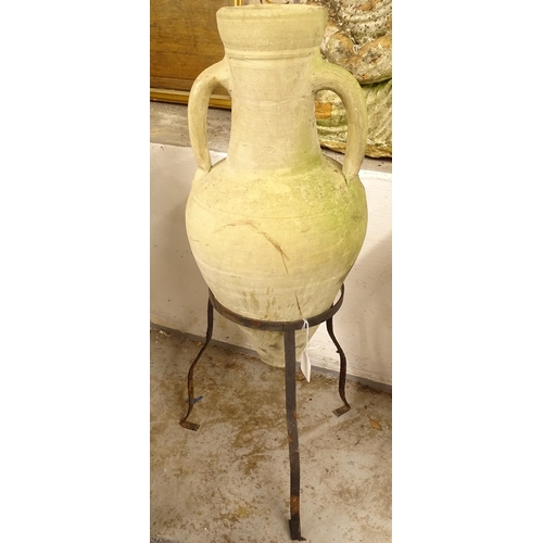 2693 - A 2-handled terracotta amphora on stand