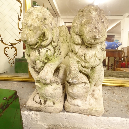 2694 - A pair of weathered concrete lion garden statues, H40cm