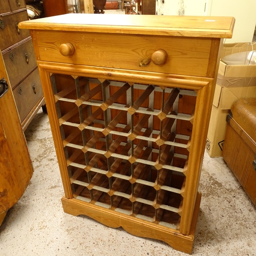 2705 - A modern pine 30-bottle wine rack with single drawer, W60cm, H82cm, D26cm