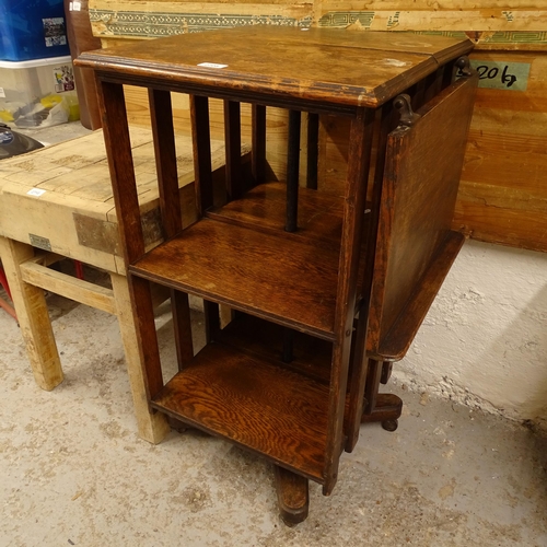 2708 - An oak revolving bookcase with adjustable book stand, W53cm, H94cm, D47cm