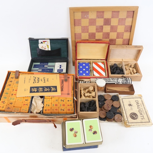 108 - Staunton boxwood chessmen, turned wood draughts, Mahjong set etc