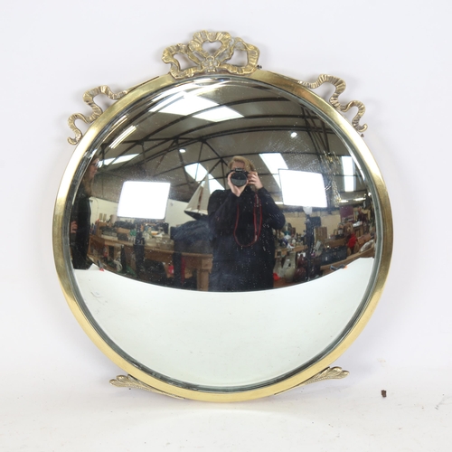 115 - A brass-framed circular convex wall mirror