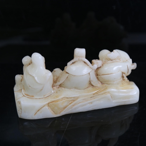 124 - A Chinese polished jade elder figure group, length 16cm