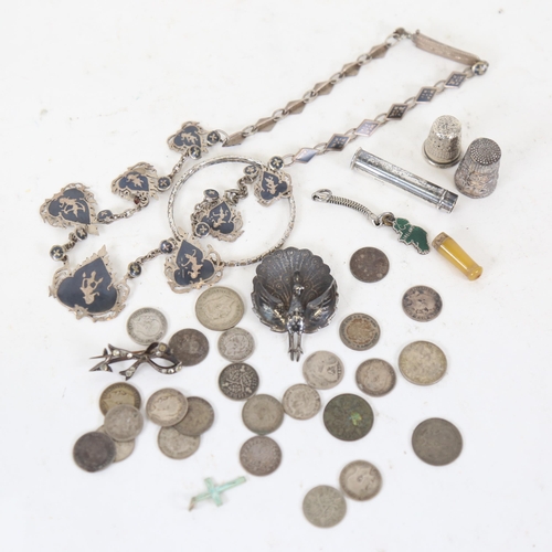 128 - Siam silver niello brooches, British coins, thimbles etc