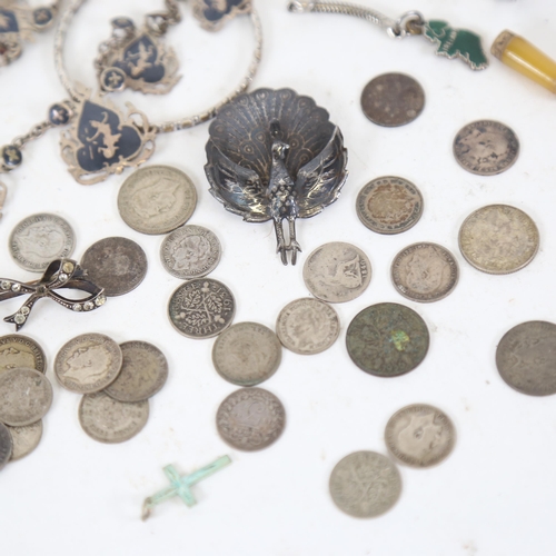 128 - Siam silver niello brooches, British coins, thimbles etc