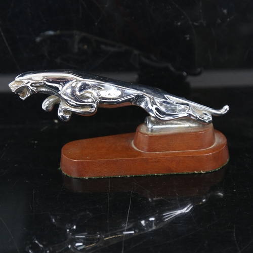 135 - A Vintage chrome plated Jaguar car mascot on plinth, length 20cm