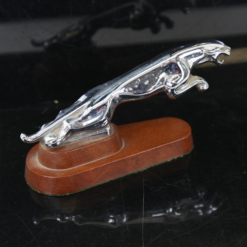 135 - A Vintage chrome plated Jaguar car mascot on plinth, length 20cm