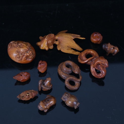 171 - A group of modern carved wood miniature netsuke (boxful)