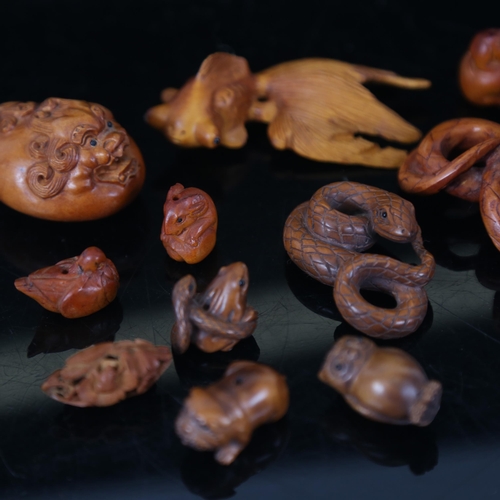 171 - A group of modern carved wood miniature netsuke (boxful)