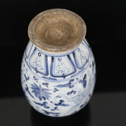 197 - A Chinese blue and white pottery vase, height 18cm