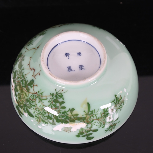 205 - A Japanese green glaze bowl, hand painted and enamel decoration, with 4 character mark, diameter 18.... 