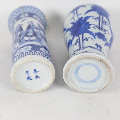 207 - A Chinese blue and white baluster jar, and a similar Prunus pattern sleeve vase, height 20cm, both A... 