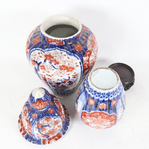 210 - 2 Japanese Imari style jars, largest height 35cm