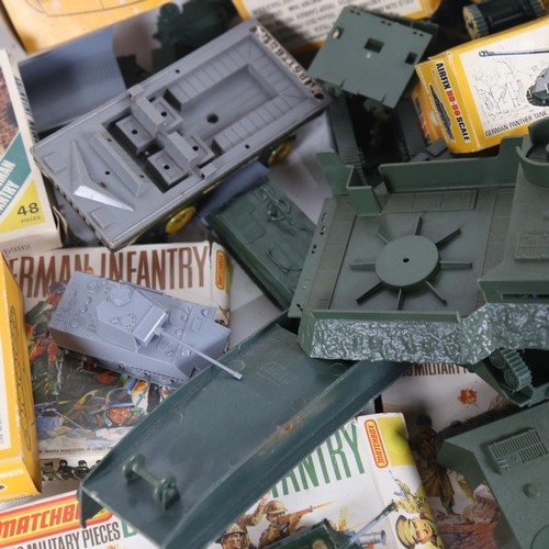 224 - Various Vintage Airfix military toy vehicles and some boxes, including landing craft, troop carrier,... 