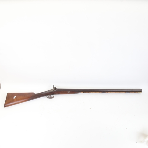 60 - A 19th century percussion sporting gun, with engraved locks and hammer, and indistinct signature Kee... 