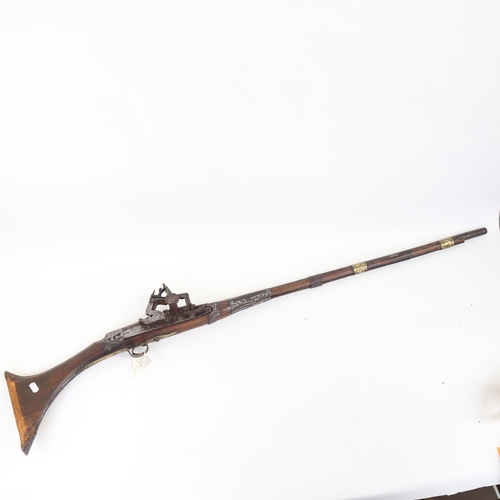 63 - A Persian Kabyle Snaphaunce muzzle loading musket, length 117cm