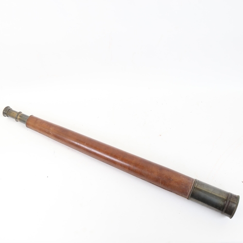 69 - A large leather-covered 2-draw telescope, extended length 103cm