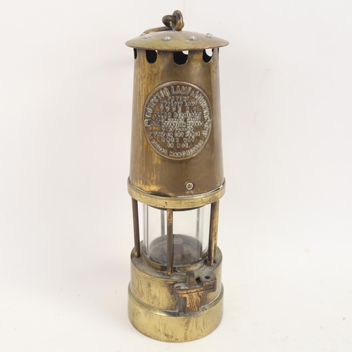 75 - A brass miner's lamp, by Protector Lamp & Lighting Co Ltd, height 26cm