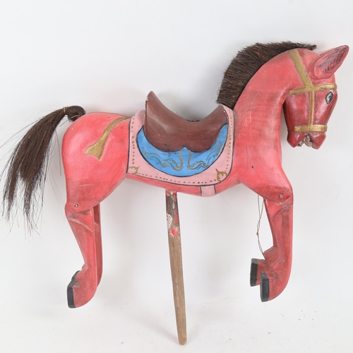 82 - An Oriental carved and painted wood horse puppet, length 36cm