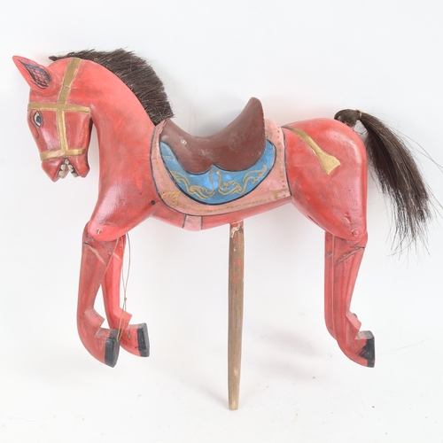 82 - An Oriental carved and painted wood horse puppet, length 36cm