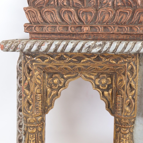 84 - An ornate painted temple design double photo frame, 43cm x 41cm