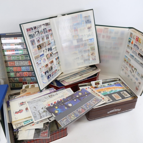 97 - A large quantity of various postage stamps, albums, First Day Covers etc (2 boxes)