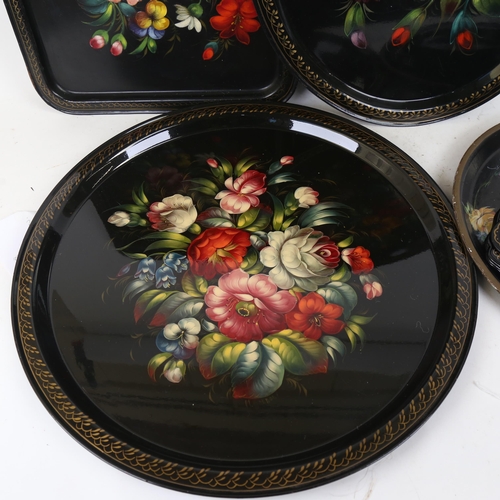 266 - A group of Russian hand painted black lacquer tea trays (11)