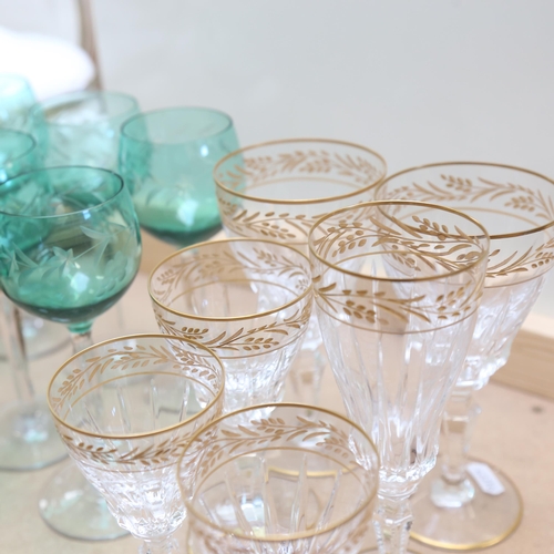 315 - 6 gilded Val St Lambert glasses, and a set of 11 green glass red wine glasses