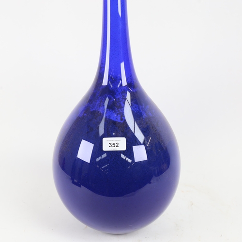 352 - A large modern Bristol blue glass floor standing vase, sand-filled, height 100cm