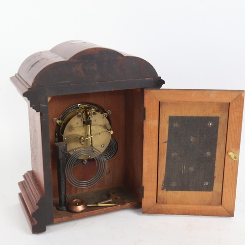 385 - Mahogany and brass architectural 8-day mantel clock, case height 27cm