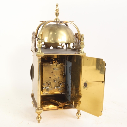 387 - A Victorian brass lantern clock, 8-day lever escapement striking on bell, case height 27cm