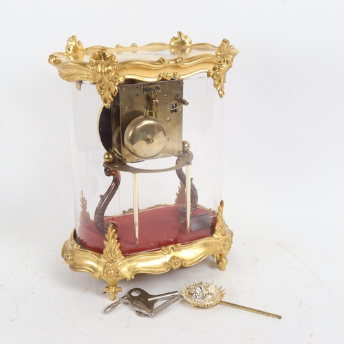 389 - Modern gilded 8-day skeleton clock, case height 30cm