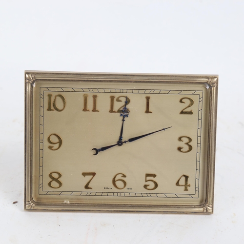 393 - An Art Deco gilt-brass 8-day strut mantel clock, case height 12cm