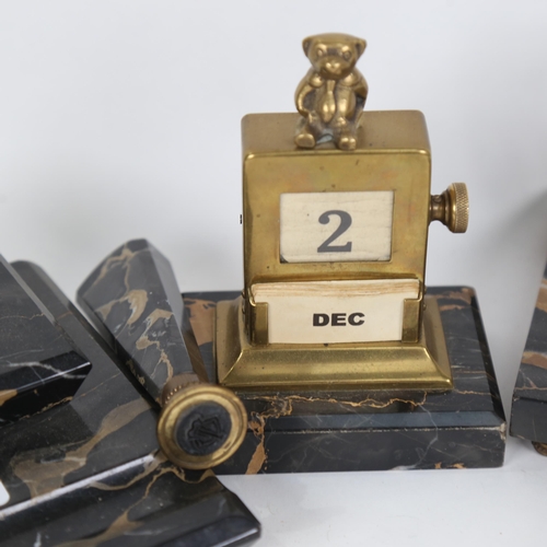 439 - An Art Deco marble desk set, comprising inkwell, calendar, letter rack, blotter and seal (5)