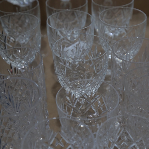 442 - A suite of crystal glassware, including Hock glasses and Whisky tumblers