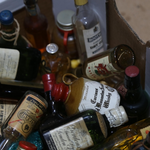 468 - A box of miniature spirit bottles, Gin etc