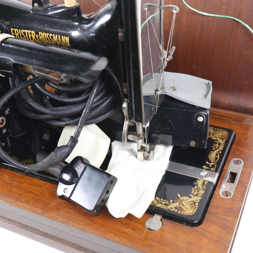 476 - A Vintage Frister & Rossman sewing machine, with accessories