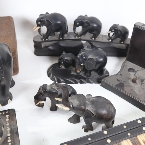 491 - Carved ebony elephants, a porcupine quill box, length 18cm, and an Eastern carved wood box