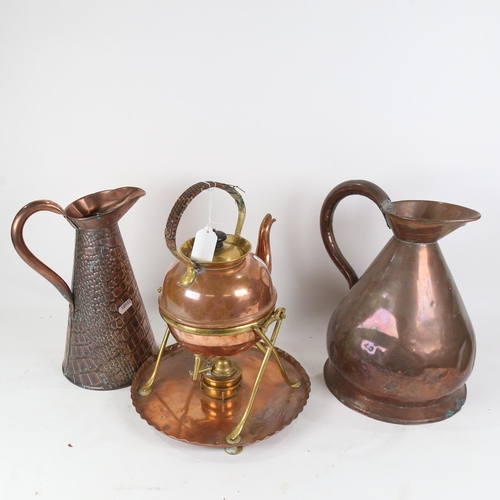 493 - A WMF spirit kettle and stand, and 2 Antique copper jugs