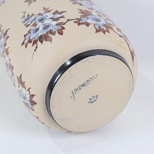 500 - A porcelain vase with enamelled blossom decoration, 38cm, signed