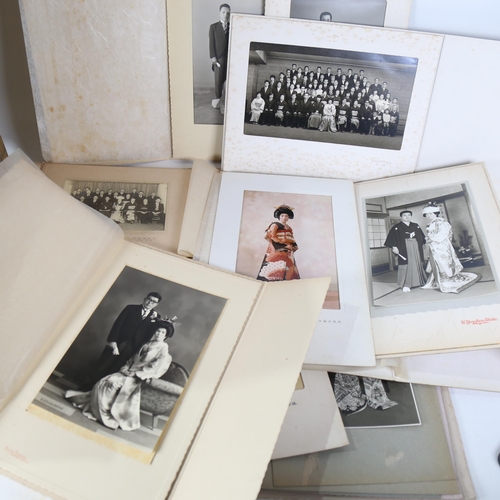 513 - A boxful of Japanese studio portrait photographs