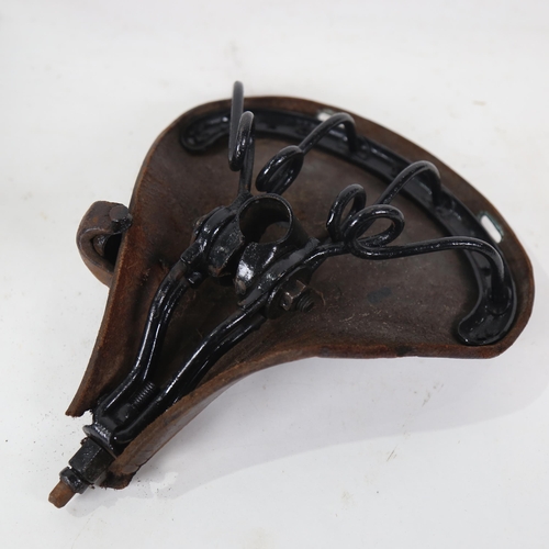 521 - A Vintage Olympic leather bicycle saddle