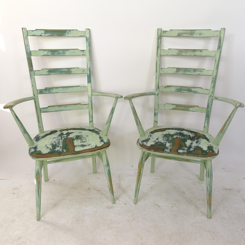 2116 - A pair of painted Ercol ladder-back elbow chairs